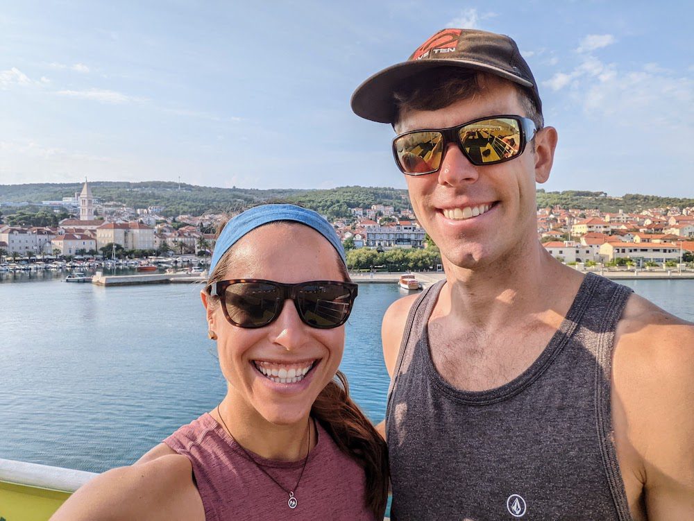 a couple on a ferry about to arrive in supetar on Brač