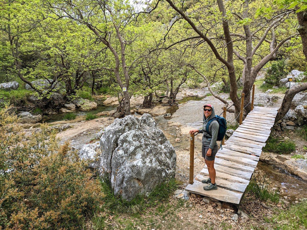 woman on a bridge just before walking into Vytina